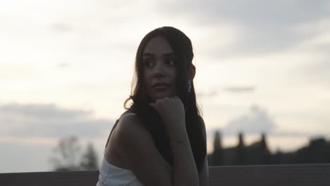 woman-sits-outside-and-is-annoyed-or-bored