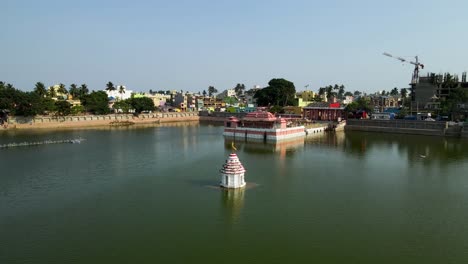 aerial drone shot of jagannath puri during the festival season, with vibrant colors and crowds filling the city.