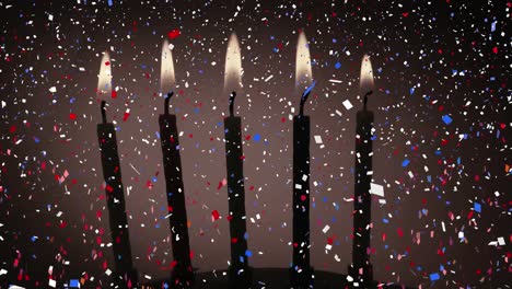 Digital-composition-of-colorful-confetti-falling-over-burning-candles-against-grey-background