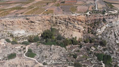 Aerial-drone-video-from-western-Malta,-Mgarr-area,-Fomm-ir-Rih-bay