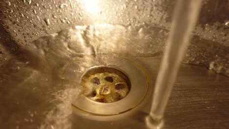 water flowing into a drain