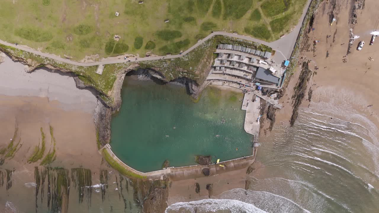 Aerial view of Bude Sea Pool and beach in Cornwall, UK
