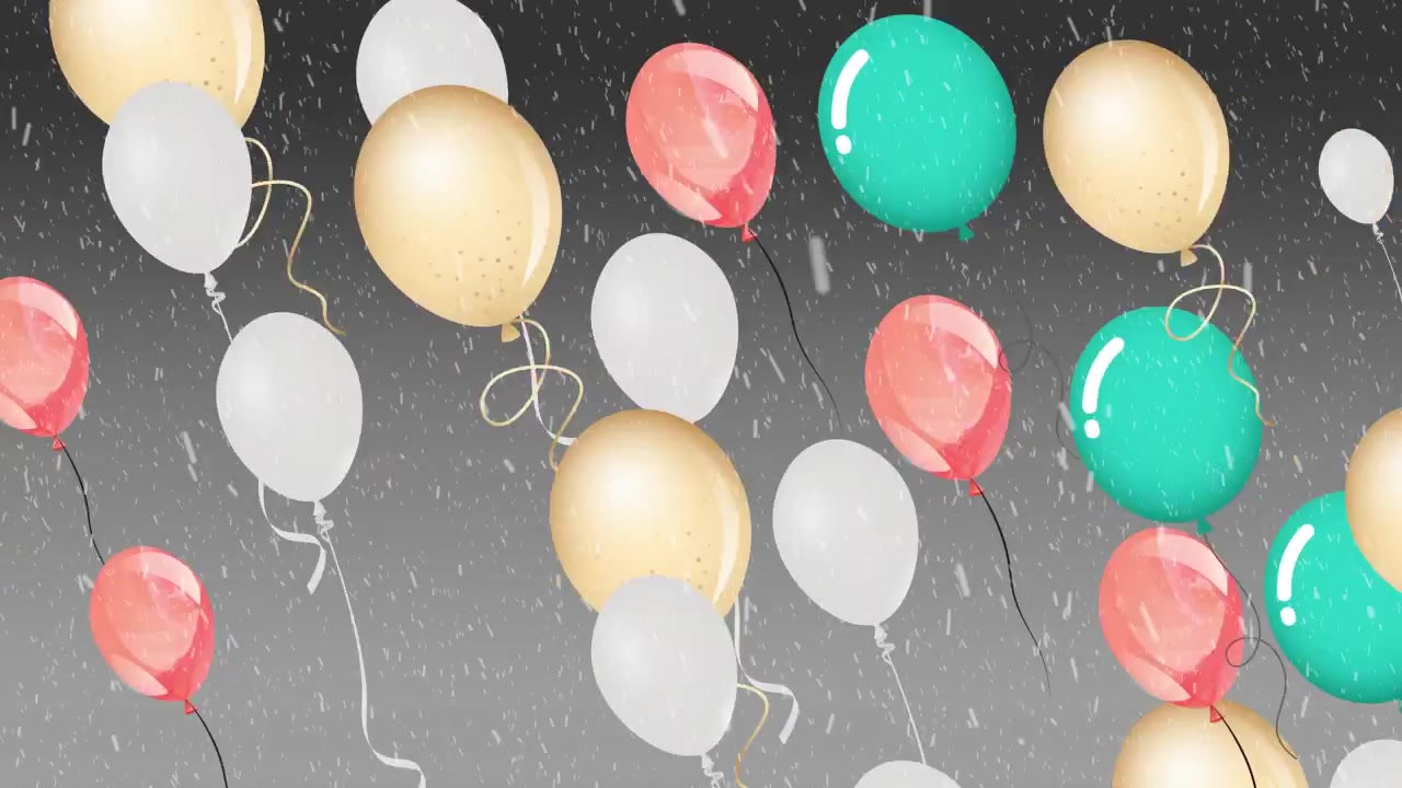 Palloncini colorati che fluttuano su uno sfondo grigio innevato