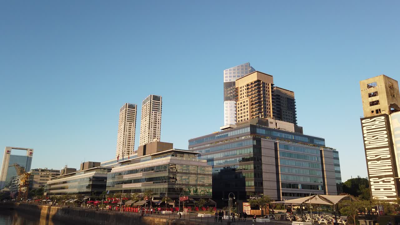 Panoramic at Skyscrapers and tourists in Puerto Madero business center, Argentine travel landmark