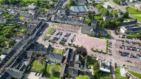 sainte mere eglise normandy france pull back drone aerial reverse reveal