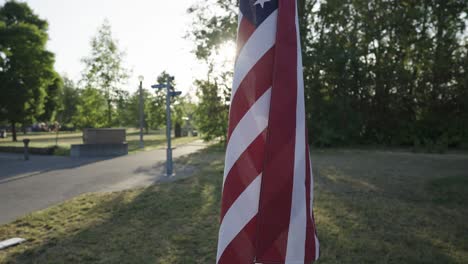 flag of the united states of america with the morning sun from behind