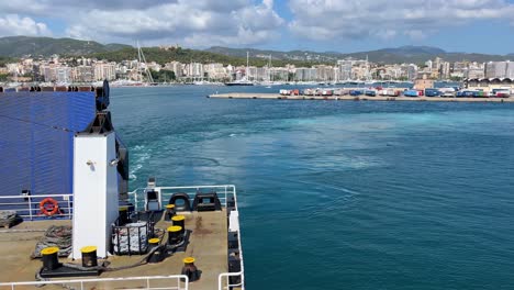 ferry boat transport of cars and passengers balearic islands mallorca from barcelona  departure from the port close-up of the tail of the ship