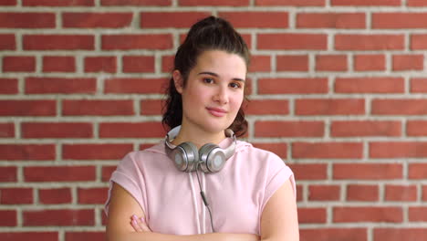 portrait of a trendy confident woman against a red