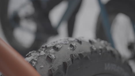 close up fat bike tires in the snow
