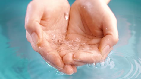 hands gathering water