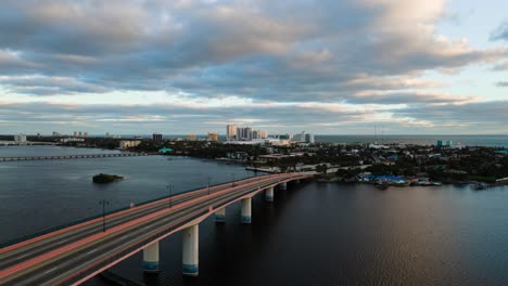 amazing aerial time lapse of cars driving through a bridge at the halifax river in daytona beach, florida
