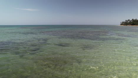 Flyby-in-Las-Terrenas-Tropical-Beach-with-Crystal-Clear-Water,-Dominican-Republic