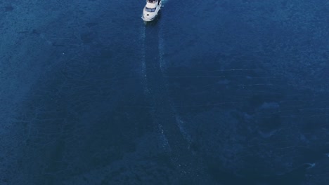 Yachting-On-Frozen-Water-During-Winter-In-Tacoma,-Washington,-USA