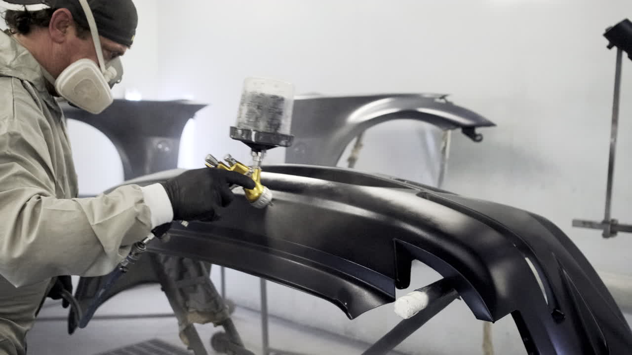 Car Body Painting in a Repair Shop