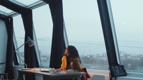 businesswoman leaving office after workday