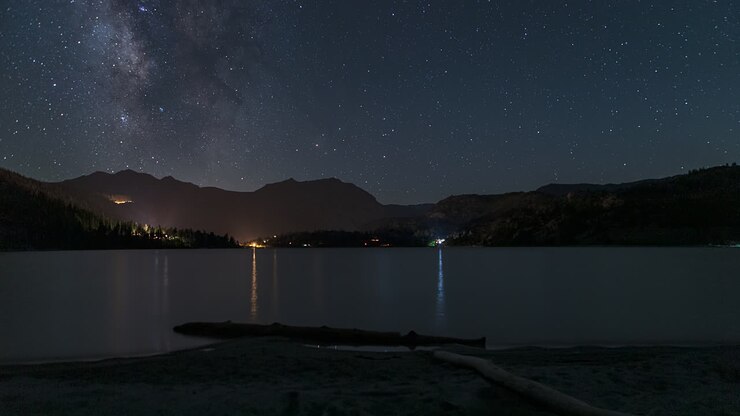 Starry Night Over June Lake At Night In California, USA