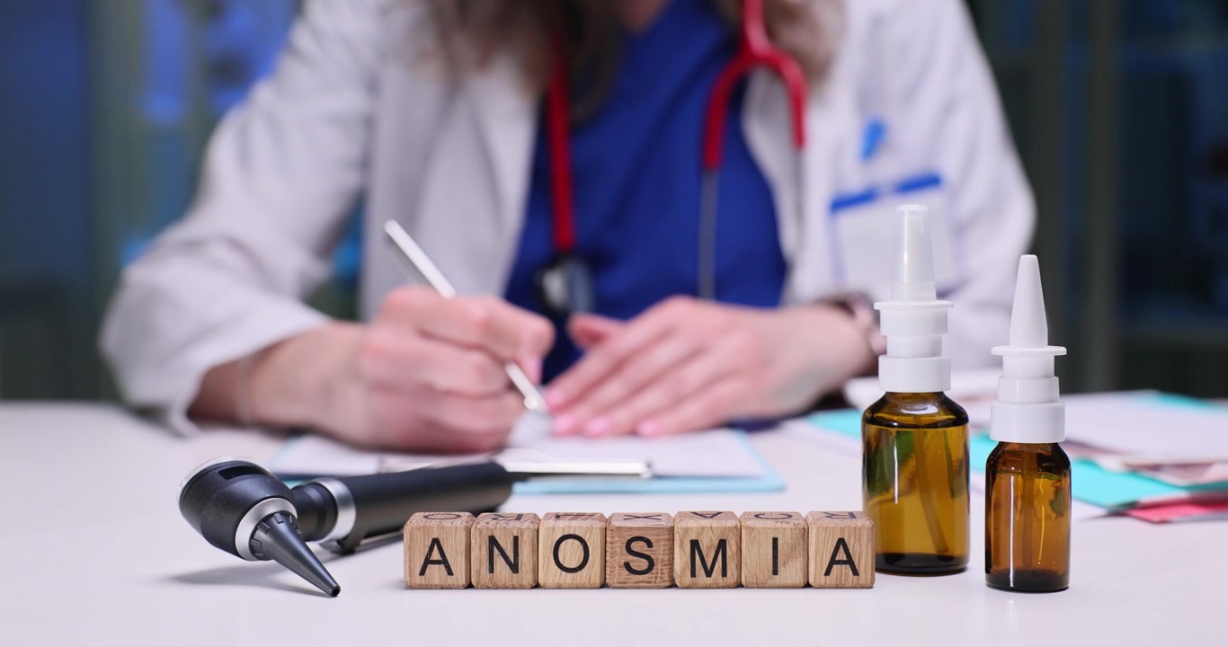 A qualified doctor examines anosmia using medical tools and detailed documentation