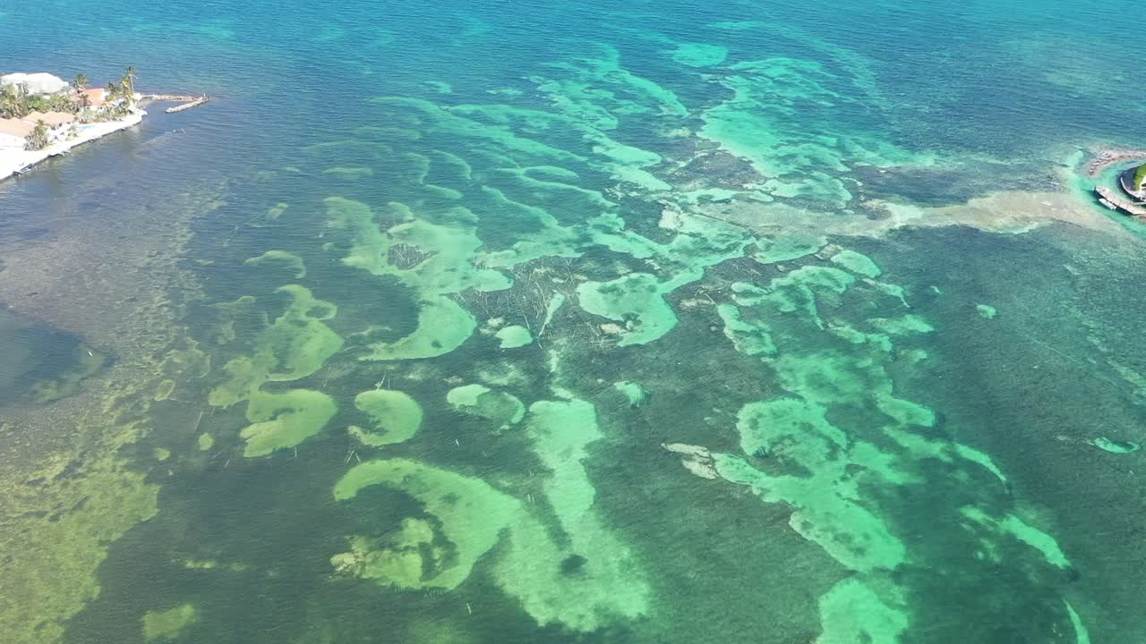 Aerial View of Shallow Ocean Water with Underwater Patterns
