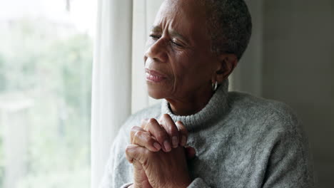 Window,-thinking-and-elderly-woman