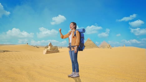 Excited Woman Traveler in Egypt Desert