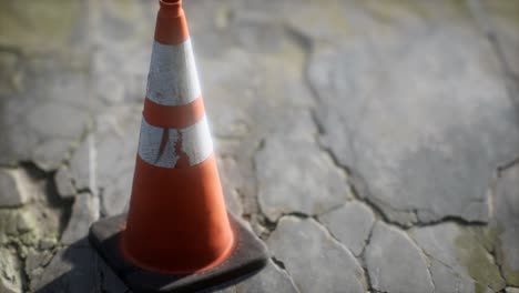 orange and white striped traffic cone