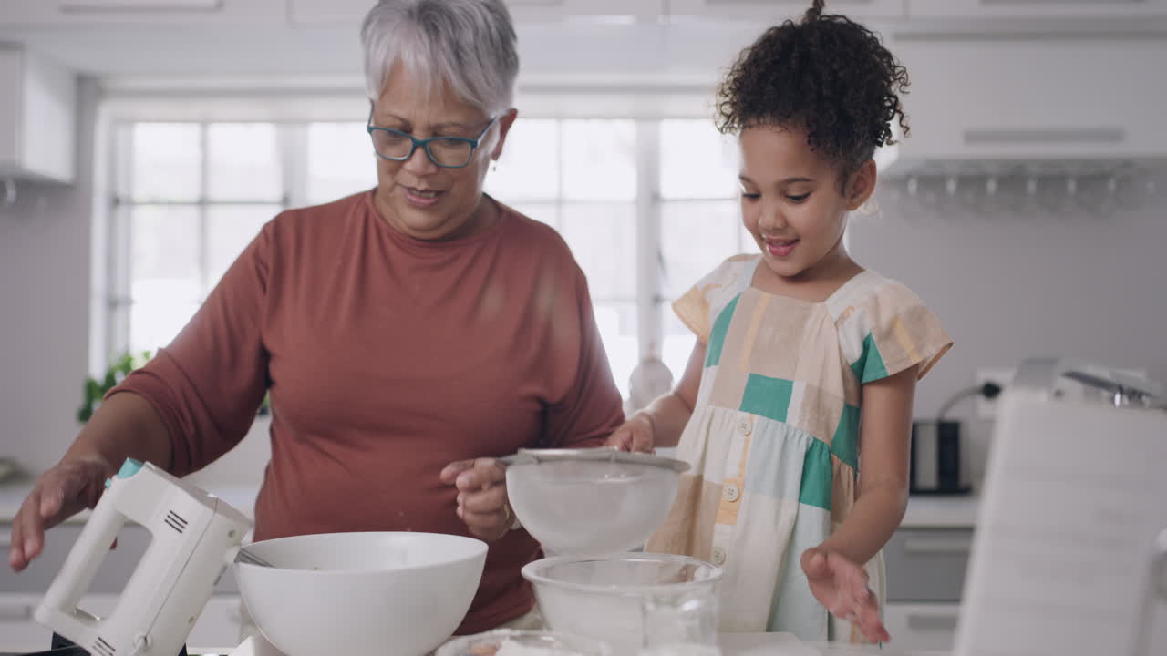 Grandmother and child baking