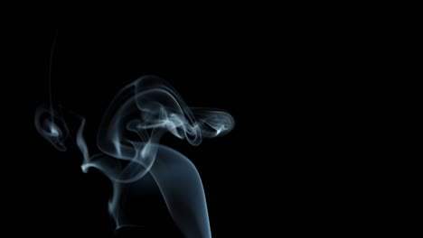 jet of smoke on black background.