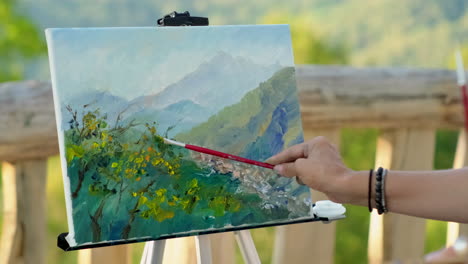 artista pintando un paisaje