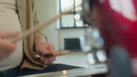 old musician playing drums