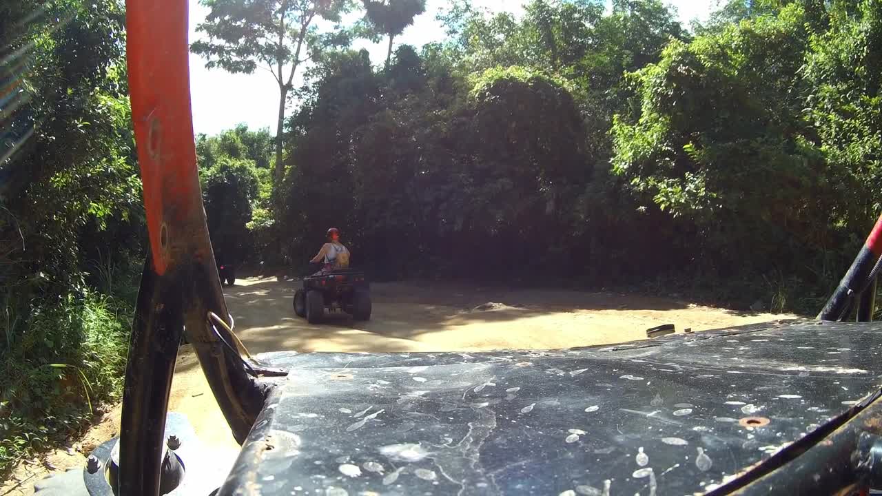 driving a buggy ATV in view in Thailand jungle