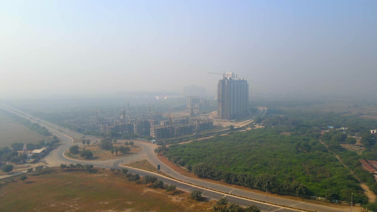 Aerial drone shot capturing a massive construction site in Noida India
