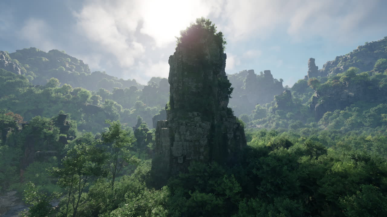 울창한 숲 위로 아오르는 웅장한 산꼭대기