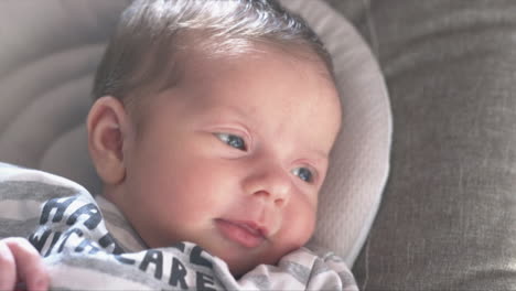 a baby her face while she is looking around