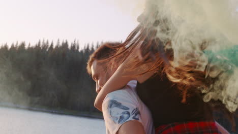 friends celebrating with colorful smoke