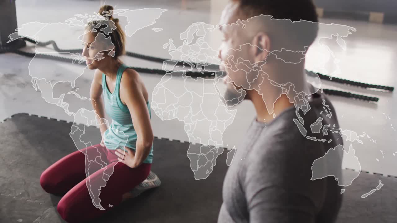 Fitness trainee kneeling on mat aligning for hip hinge move coach pointing cueing world map overlay