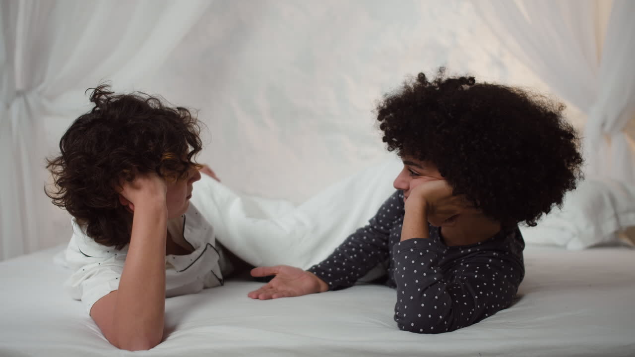 Lovely couple laying on bed