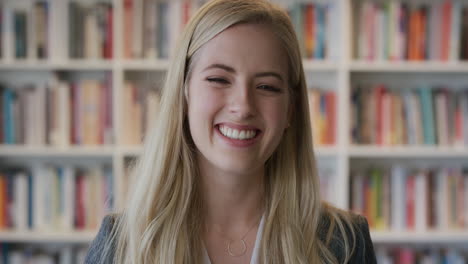 portrait beautiful happy blonde woman student laughing enjoying successful independent lifestyle cheerful young female entrepreneur in library bookstore background