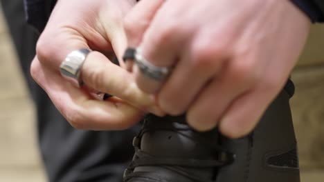 Ice-skate-being-tied-rapidly-in-real-time-in-extreme-close-up-shot