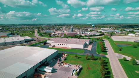 warehouses, loading docks, and green landscapes at an industrial logistics hub in de pere, wisconsin.