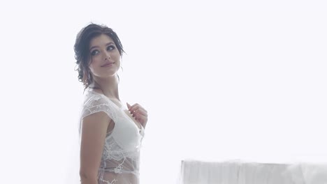 slow-motion-pretty-bride-in-white-transparent-lacy-underwear