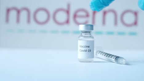 moderna covid-19 vaccine vial and syringe