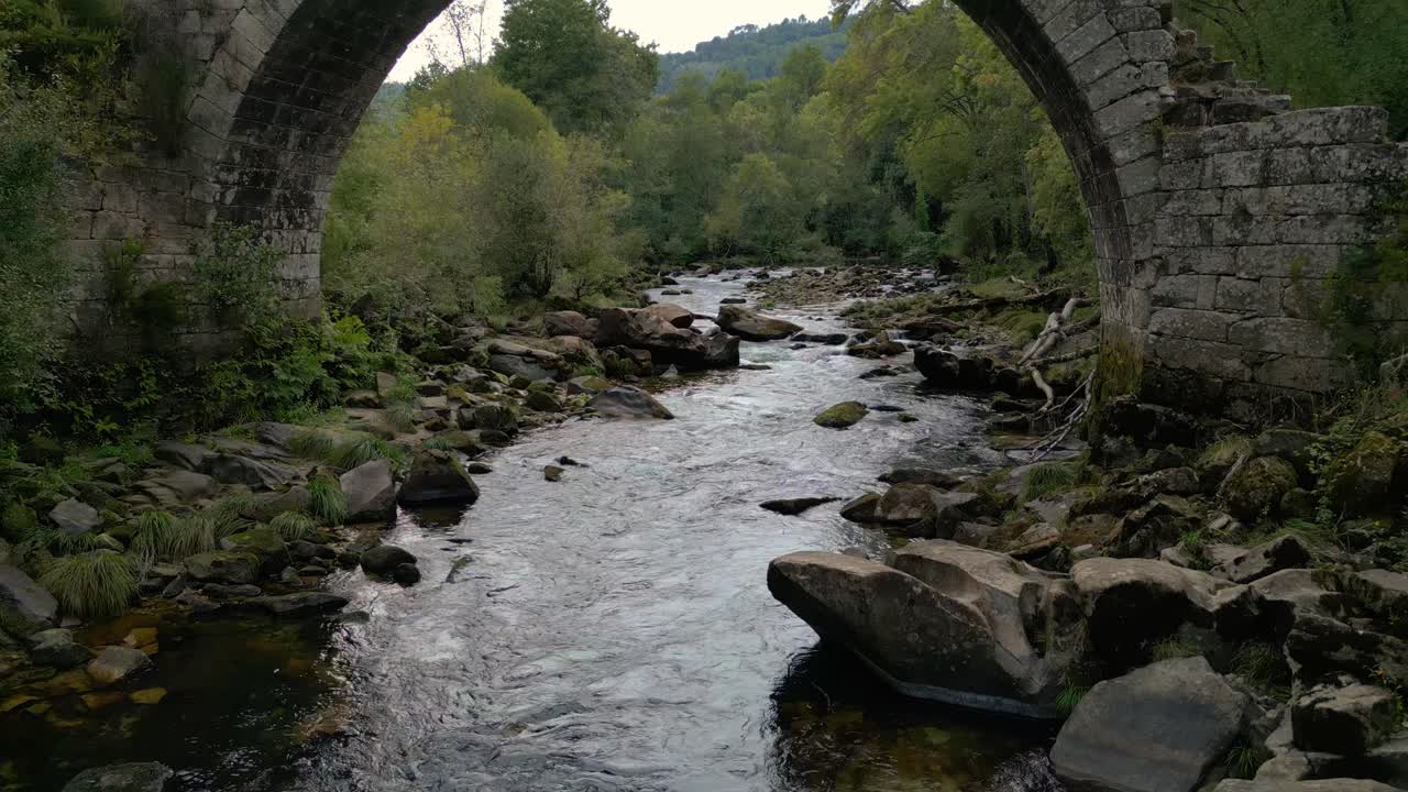 Rocky River Of Avia Near The Town Of Cenlle In Ourense Province, Spain. Aerial Pullback Shot