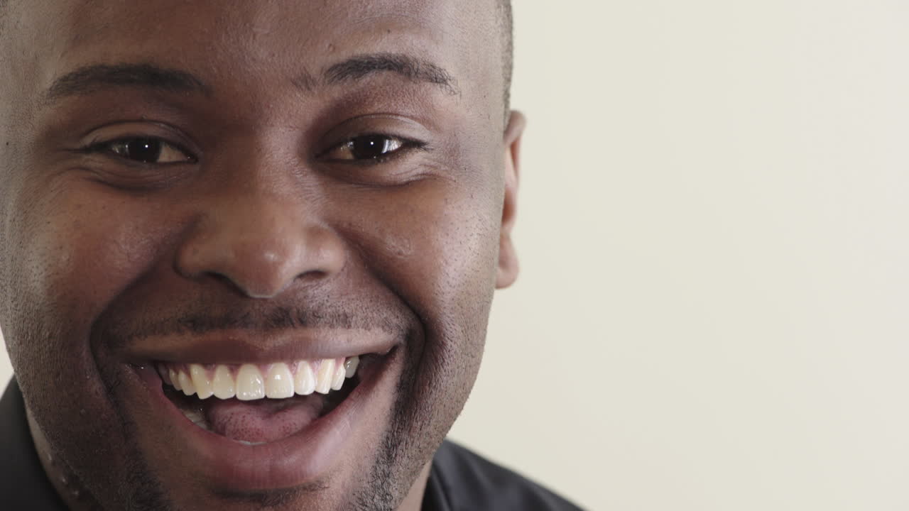 close u portrait excited african american man laughing surprised enjoying winning expression looking cheerful on white background copy space