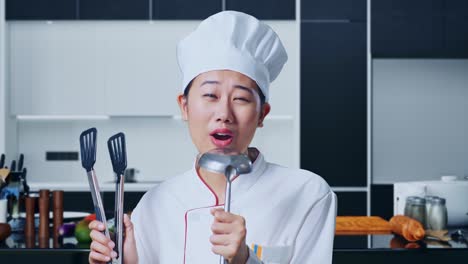 happy chef with cooking utensils