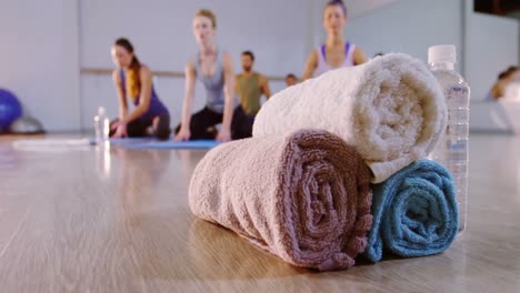 close-up of towel and water bottle