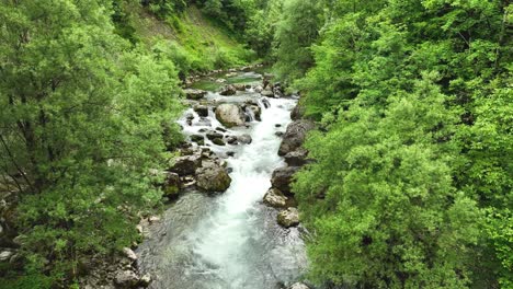 panoramic aerial landscape of logar valley slovenian natural water river flow between green lush forest