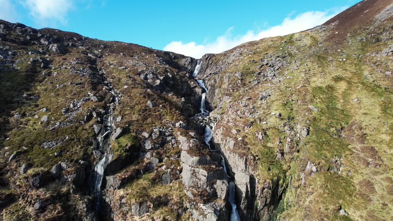 Ireland Mountains drone pulling away from stunning Mahon Falls Comeragh Mountains Waterford Ireland