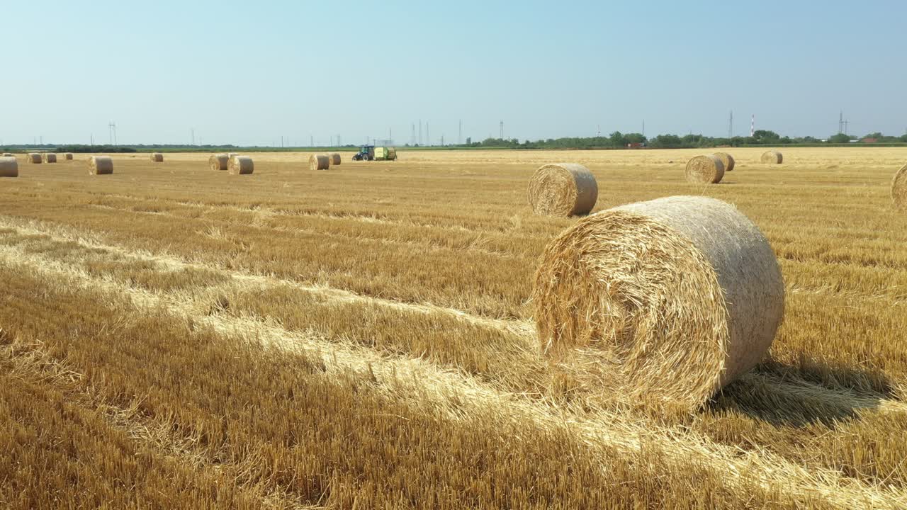 Aerial view of straw bales on farm fields