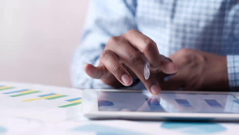 person using tablet for data analysis