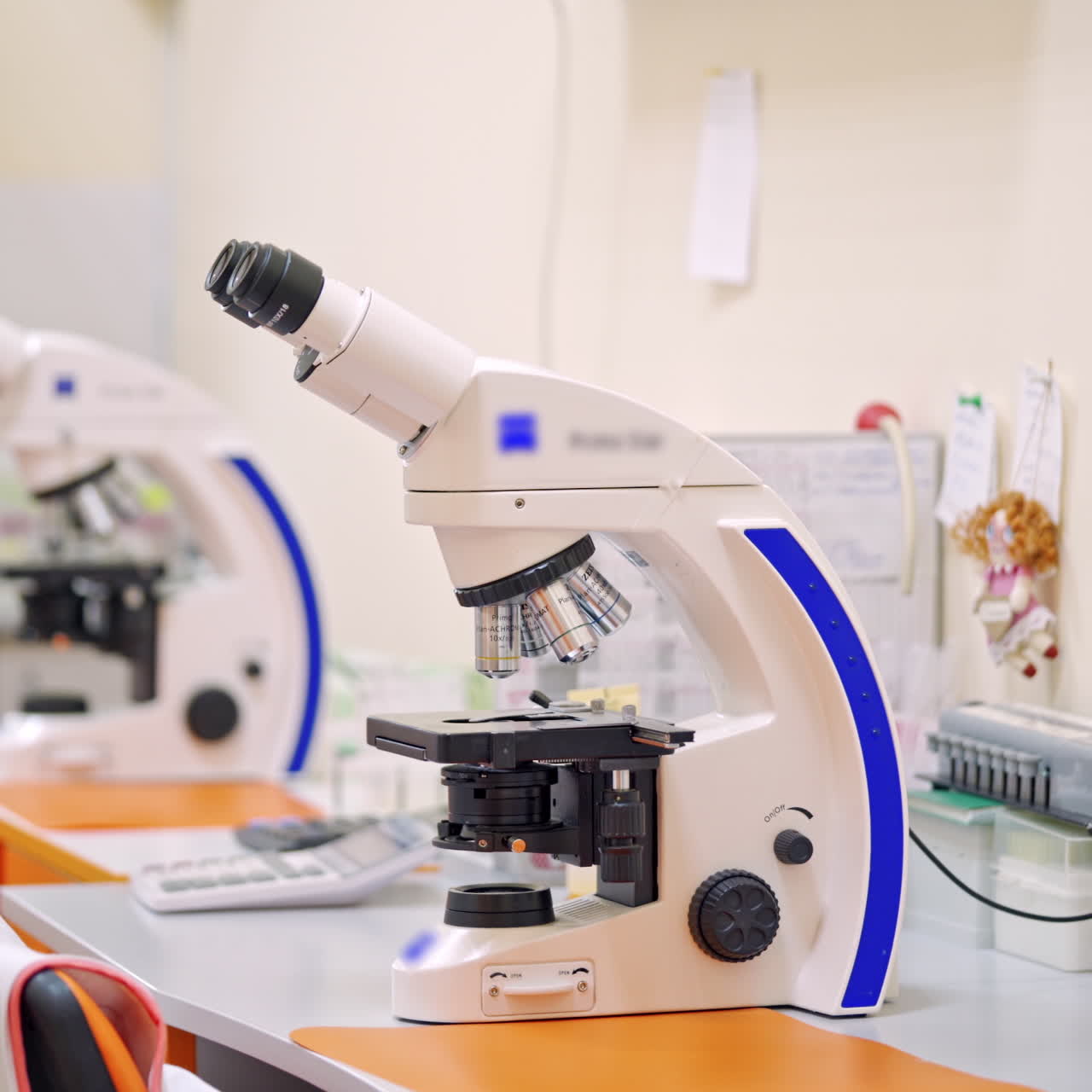 Contemporary microscope in lab. Medical equipment to make scientific researches in the laboratory. Science, profession, healthcare. Chemical reactions.